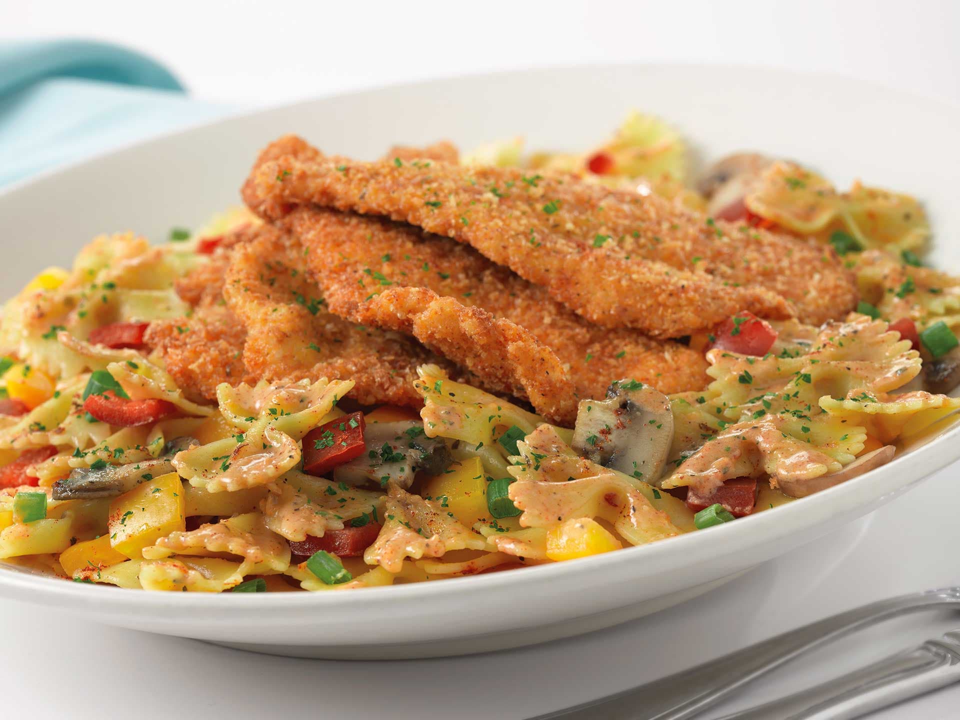https://d3n2401vhvcfv5.cloudfront.net/_images/company/Cheesecake Factory/1742840537280-CCF_LouisianaChickenPasta.jpg