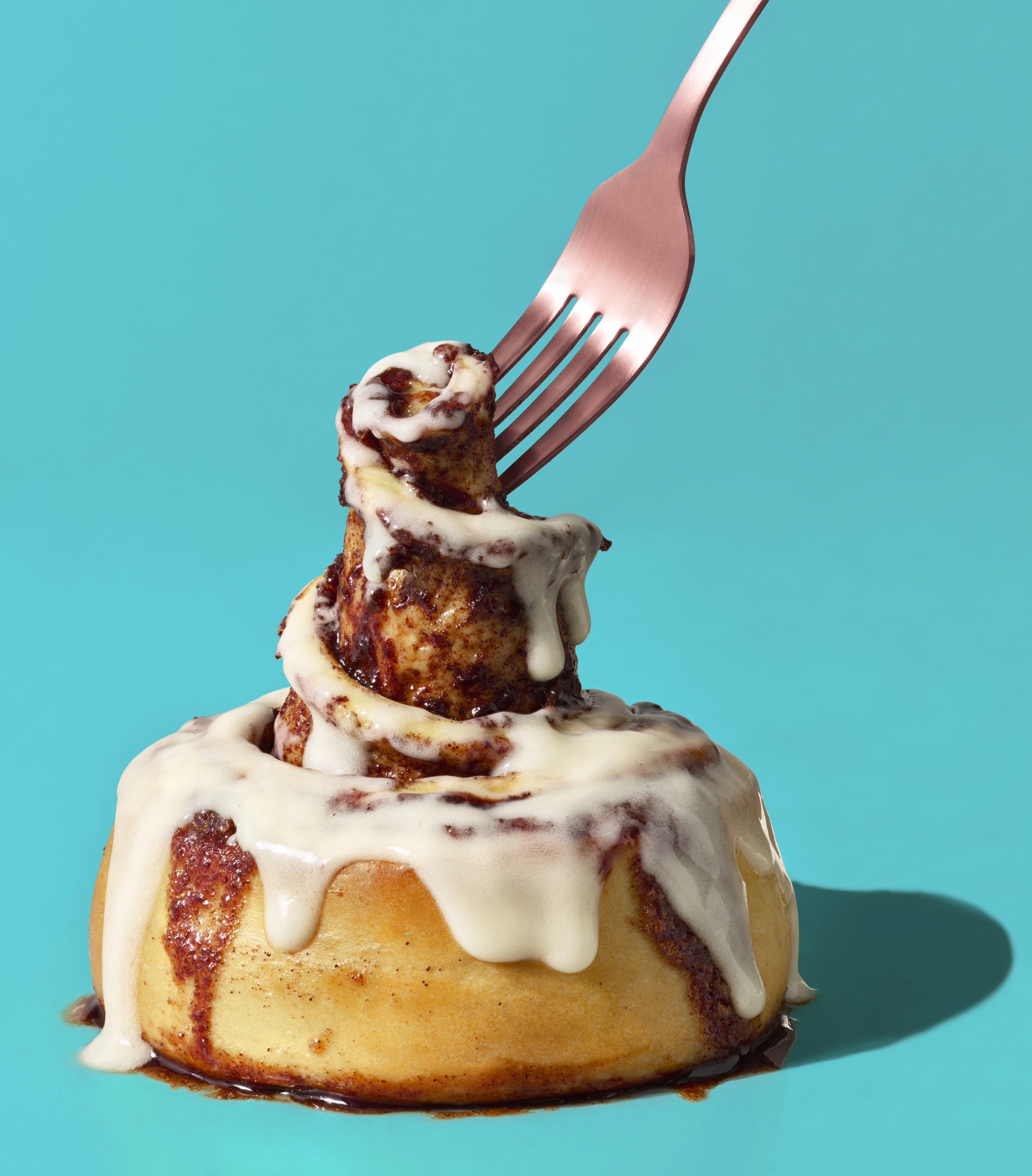 https://d3n2401vhvcfv5.cloudfront.net/_images/company/cinnabon/1734645944102-Cinnabon_ClassicRoll_ForkBite copy.jpg